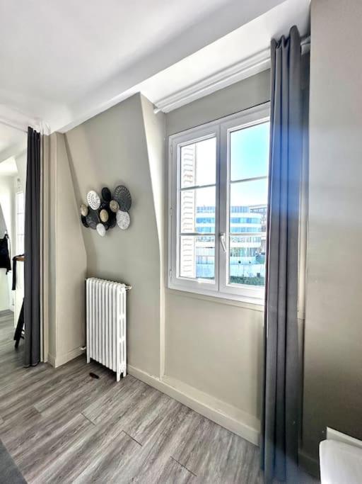 Appartement Vue Tour Eiffel Ligne 14 A Cote De Paris 장티이 외부 사진